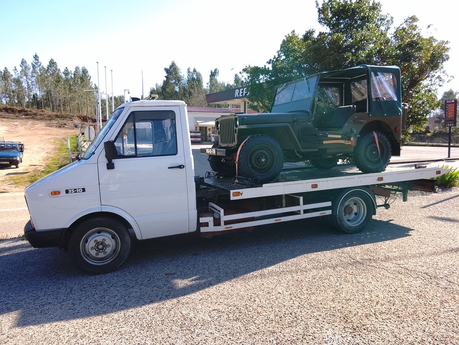 Serviços de transporte de viaturas com reboque