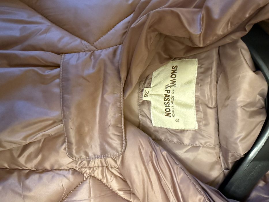 Пуховик тепленький