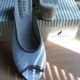 Пантолеты белые кожаные