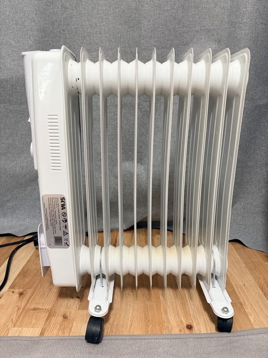 Grzejnik olejowy 2500W, 11 żeberek, stan bardzo dobry – 120 zł