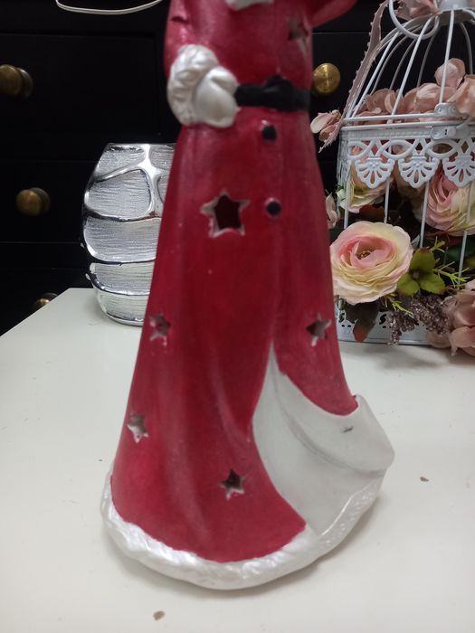 Pai natal em louça  que dá luz