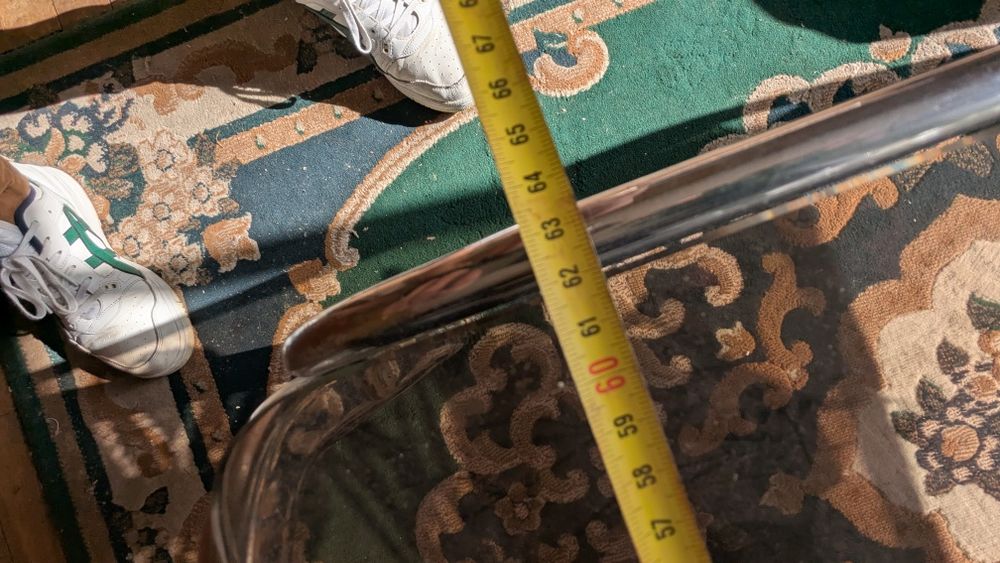 Mesa de centro em vidro – 110x60 cm – estrutura metálica