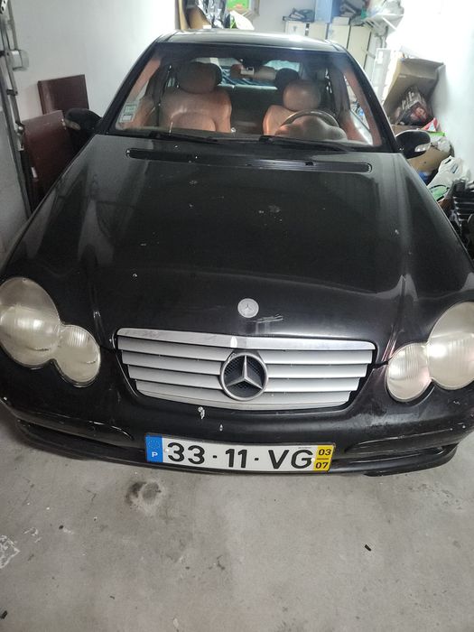 Selling black Mercedes 220