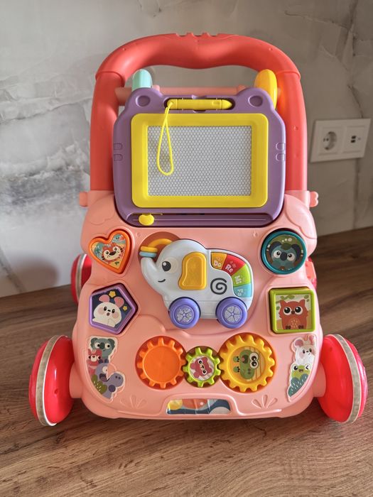 Дитяча каталка ходунки