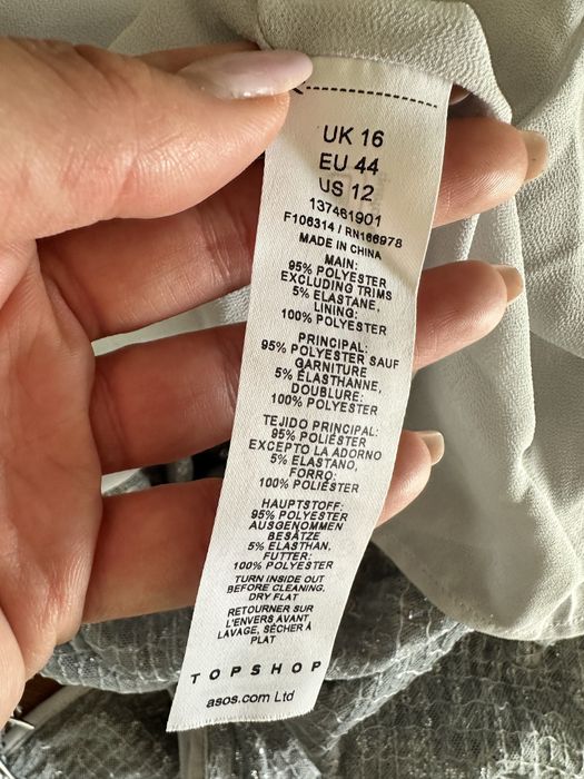 Cekinowa sukienka midi ASOS rozmiar 44 srebrna frędzle cekiny