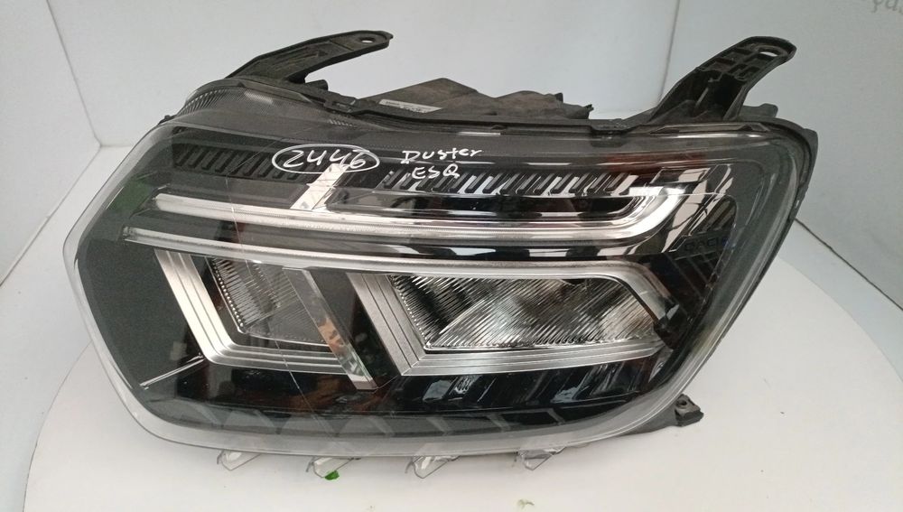 Ótica / farol esquerda DACIA Duster (HM_)