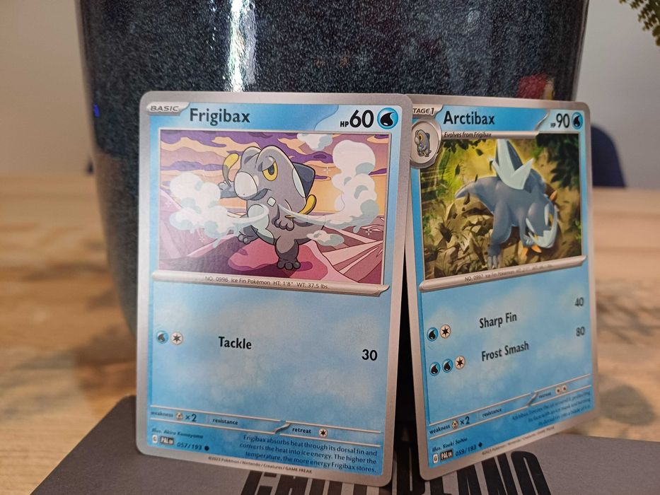2 Pokémon Cards: Frigibax #57 and Arctibax #5964730017597569120