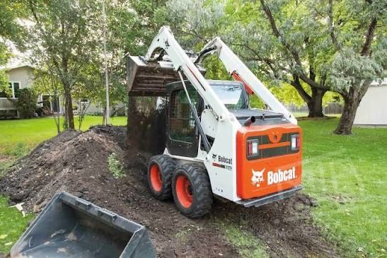 Послуги навантажувача Бобкет | Міні-навантажувач Bobcat s450