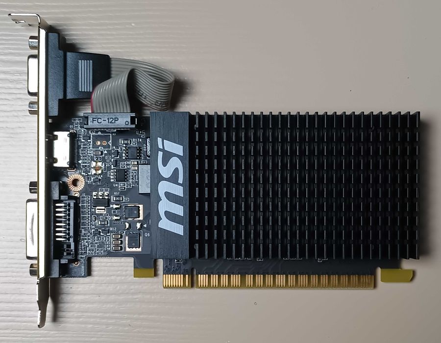 Видеокарта MSI PCI-Ex GeForce GT 710 2 Gb DDR3 (64bit) (954/1600) (DVI, HDMI, VGA) (GT 710 2GD3H LP). Бесшумная!