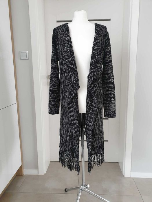 Sweter kardigan .
