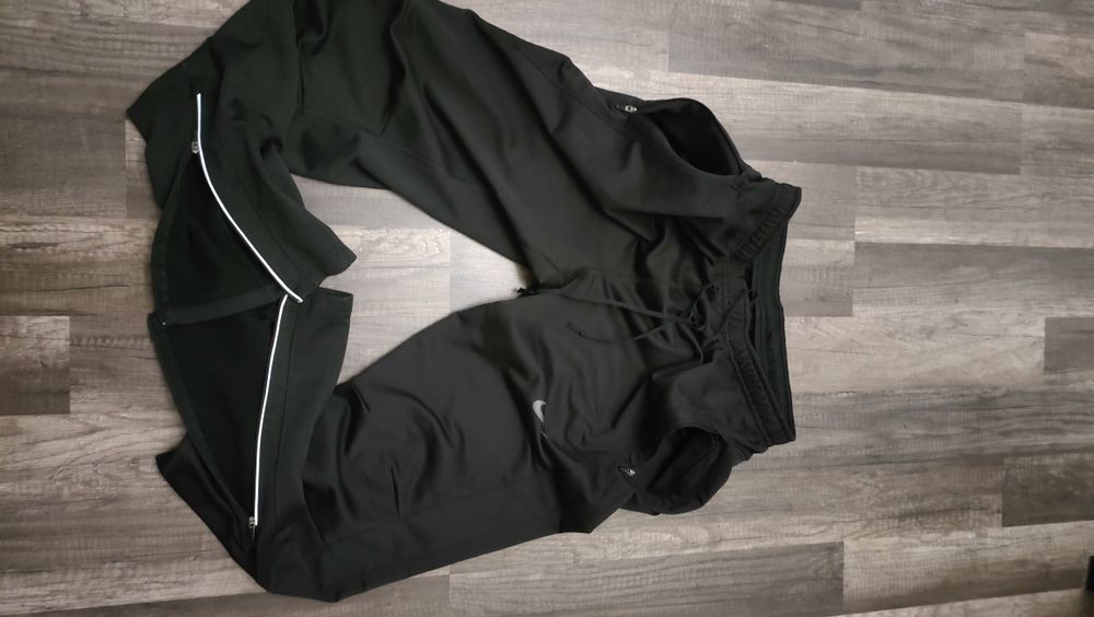 dresowe , sportowe, grubsze spodnie NIKE dri -fit z zamkami