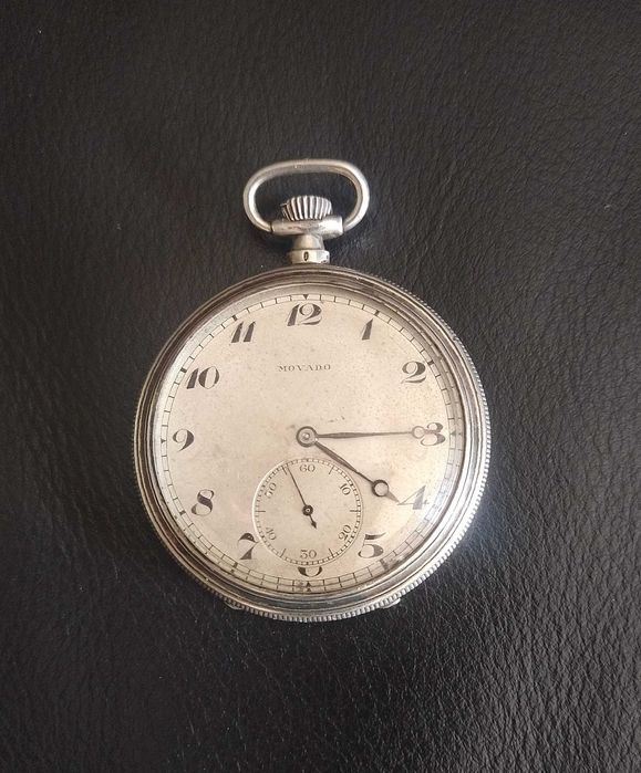 Antigo relogio de bolso Movado, em prata. Trabalha muito bem