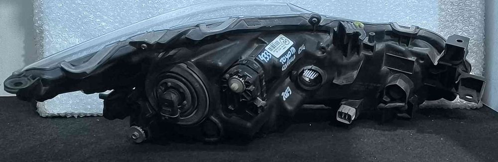 Ótica / Farol Esquerdo 81150-02T31-00 - TOYOTA COROLLA Hatchback