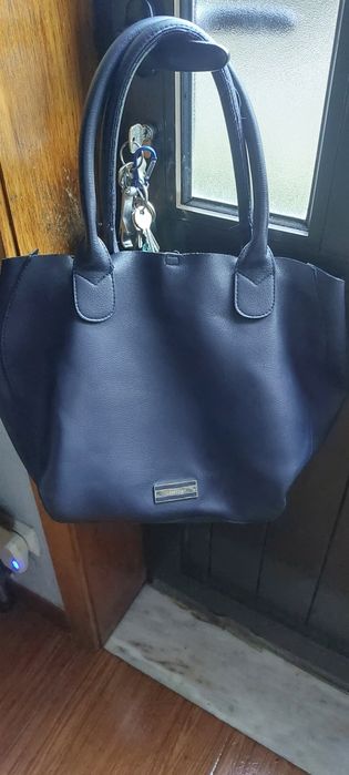 Malas de senhora novas e bonitas