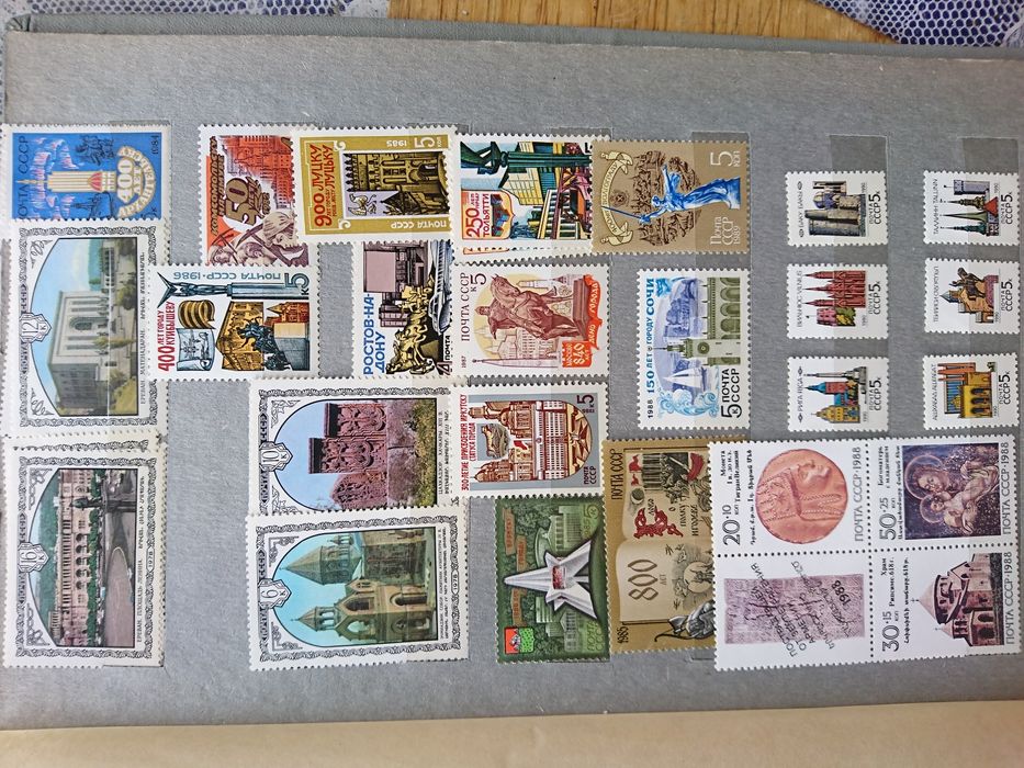 Альбом марок на тему олимпийские игры, космос, города, выставки.