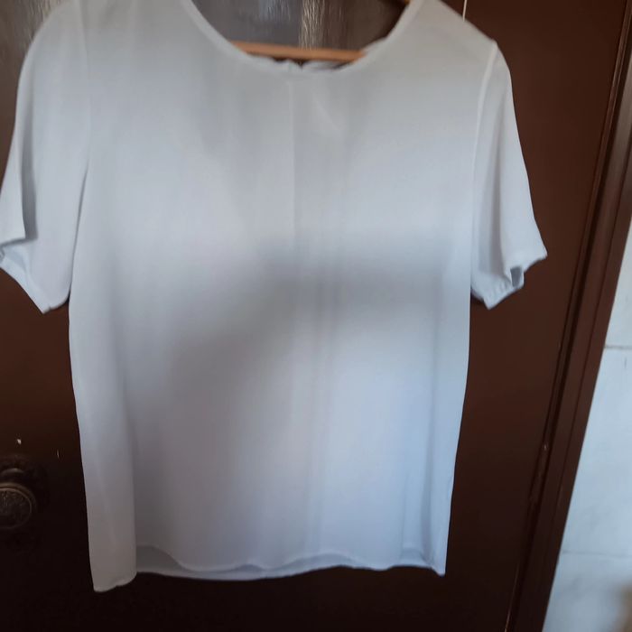 Diversas blusas para senhora