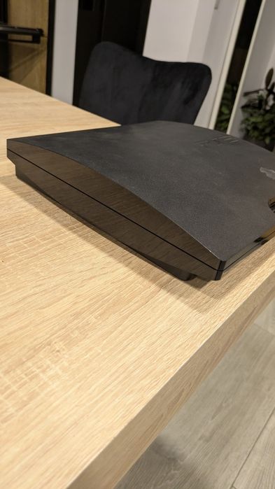 PS3 chipada em caixa