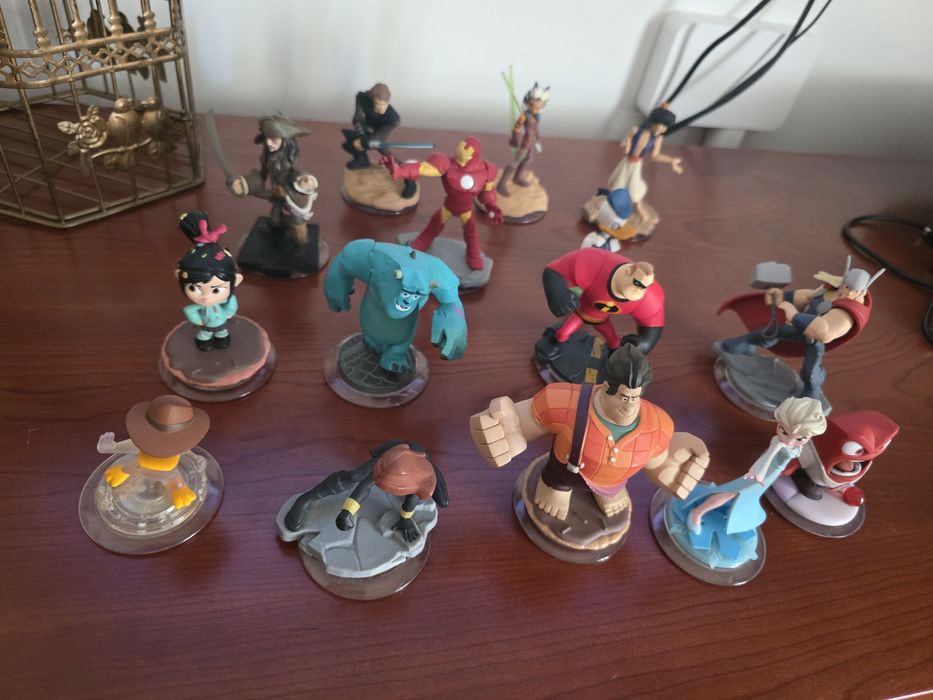 PS3 com jogos e portais e um comando