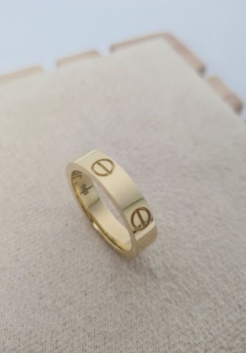 Złoty pierścionek obrączka typu Cartier śrubki p. 585