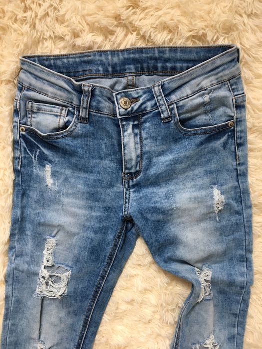 Jeansy z przetarciami xs s