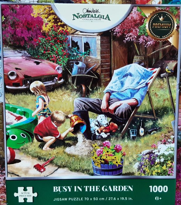 Puzzle 1000 " W ogrodzie "