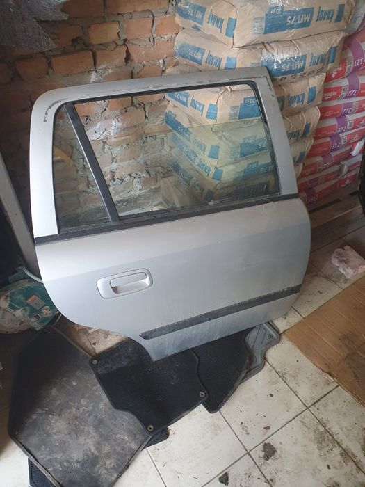 Двері   опель   астра   ж