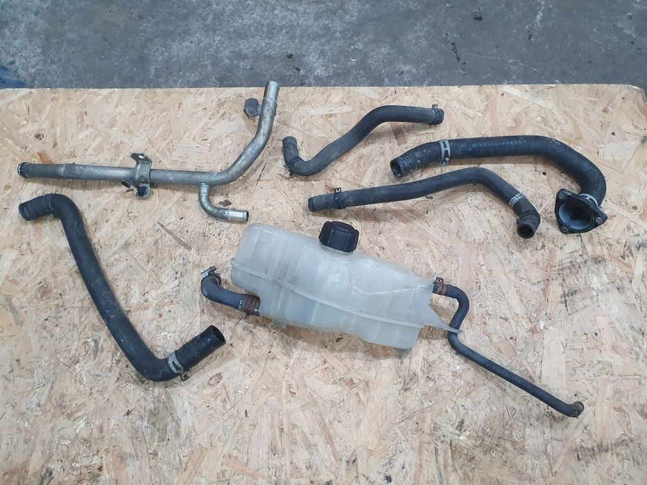 Magistrala króciec zbiorniczek wąż wodny Nissan Micra k12 1.2 04r