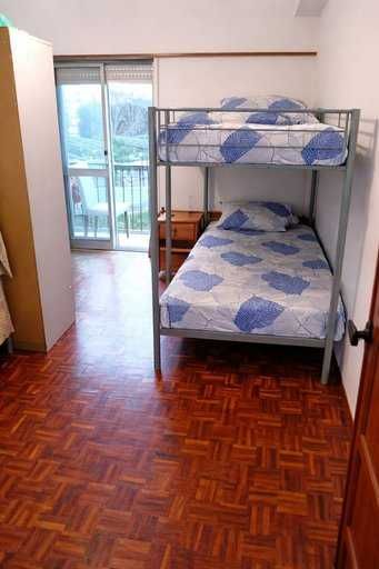 Cama em quarto partilhado