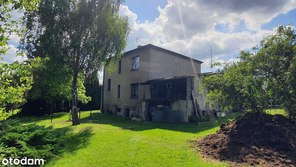 Dom z piwnicą , garażem i dużym ogrodem