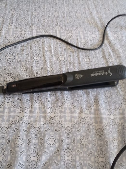 Prancha modeladora de cabelo a vapor