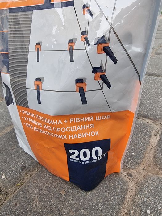 Система вирівнювання плитки