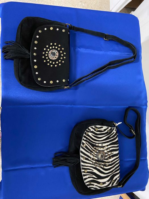 Stock de acessórios novos (cintos, carteiras, malas)