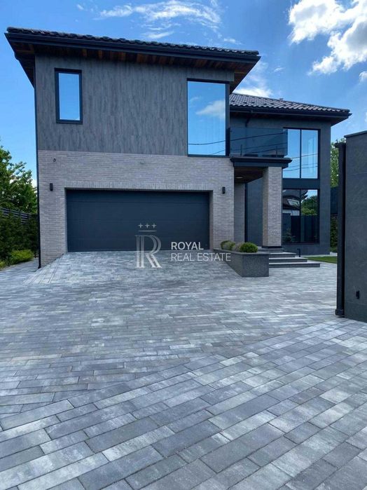 Продаж Будинок Київ Голосіївський район вул. Малокитаївська 300 м² 4 спальні Ділянка 5 соток Газ Гараж Підвал 20 кВт Під чистове оздоблення