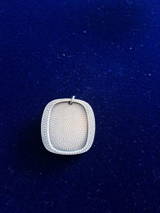 Medalik z wizerunkiem św.Antoniego trzymającym  dzieciątko Jezus