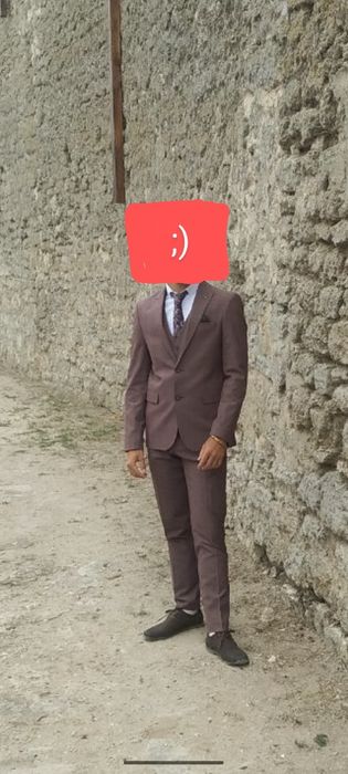 Чоловічий костюм трійка