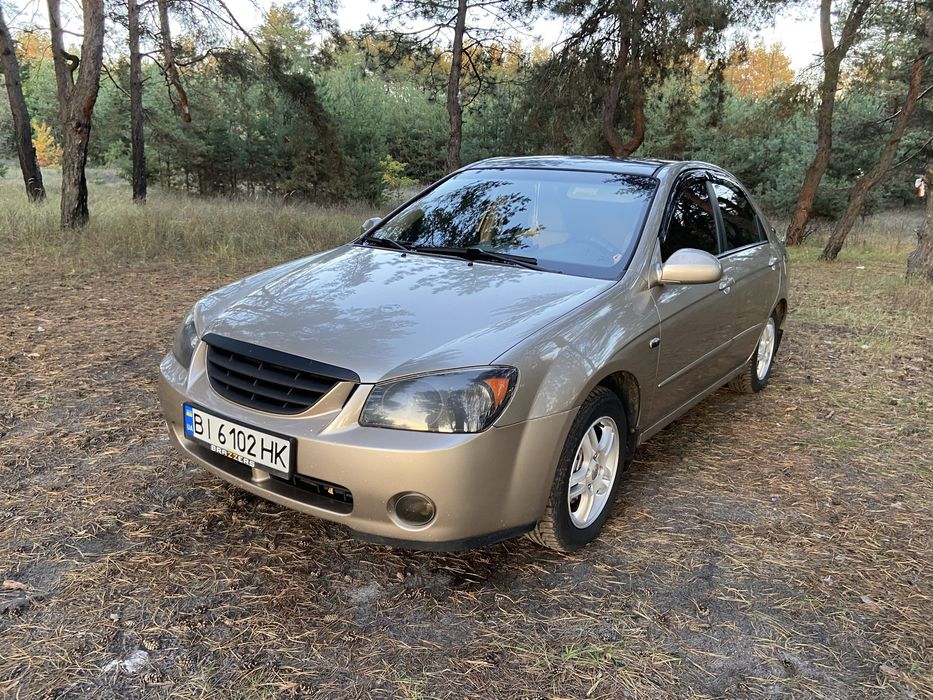Kia Cerato 1.6 Газ/Бензин Механика, максимальная Комплектация