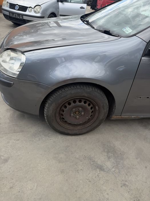 Błotnik Volkswagen Golf V LA7T lewy prawy przód