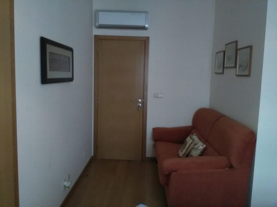 Sofá laranja 3 lugares