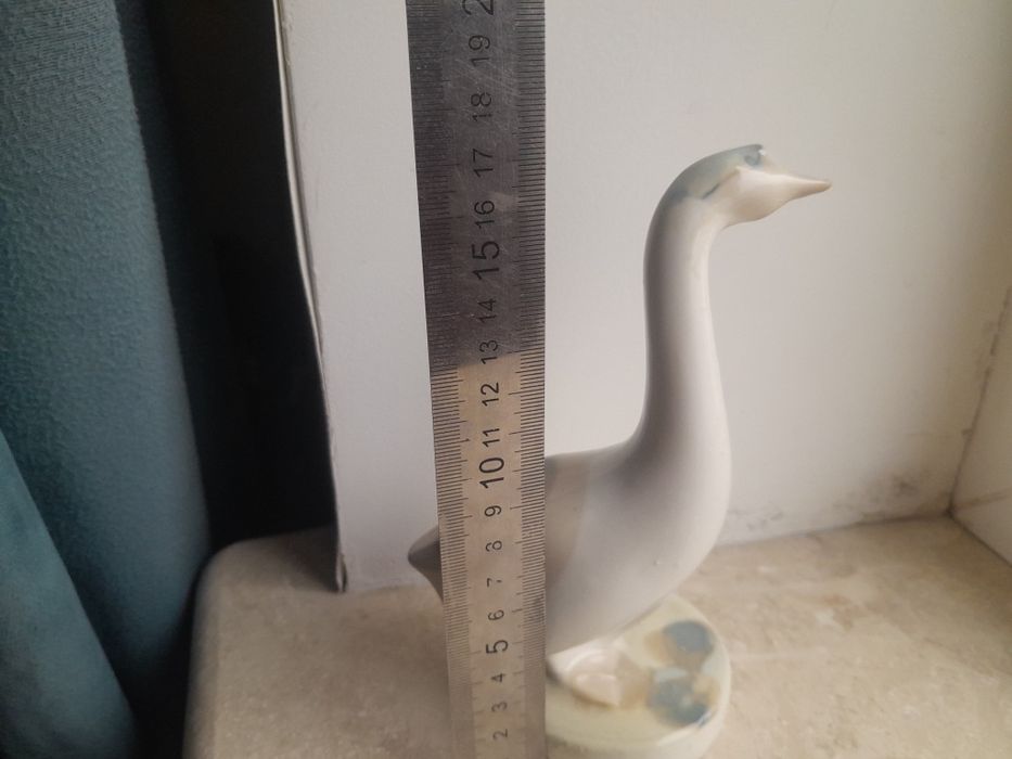 Фарфоровые статуэтки гуси,утки