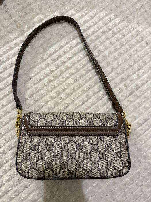 Сумка Gucci.