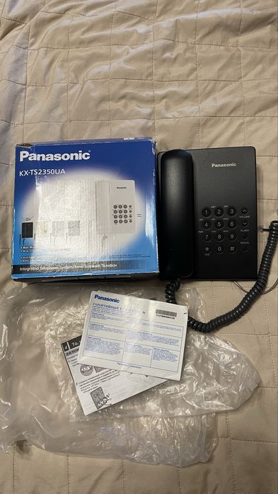 Телефон  стационарного  Panasonic в состоянии нового