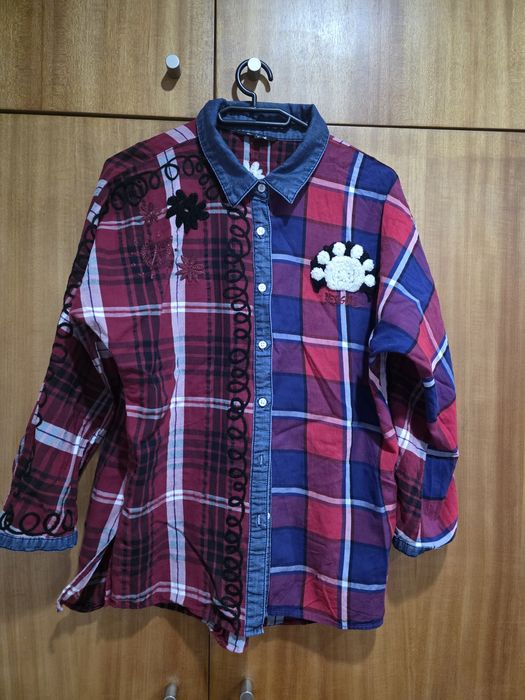 Blusa desigual em bom estado