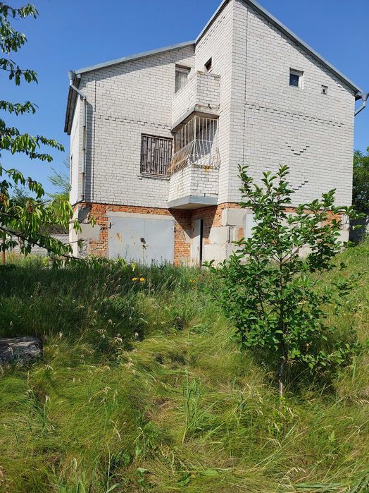 Продам дом с участком в г. Подгородное