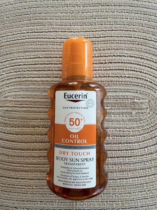 Eucerin Oil Control SPF 50+ Transparentny spray ochronny do ciała, 200 ml