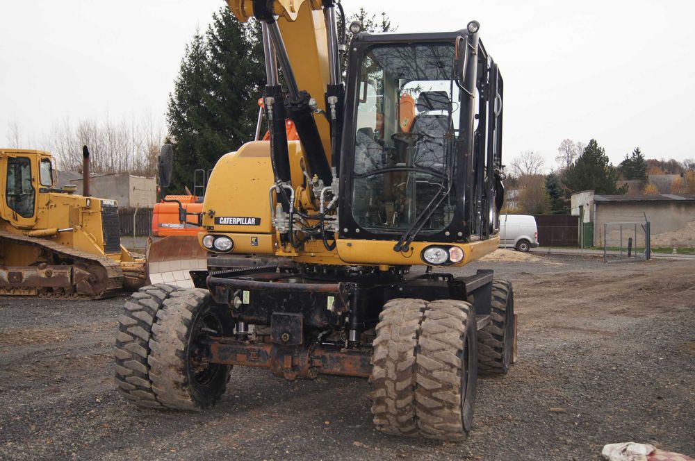 Koparka kołowa CAT 316