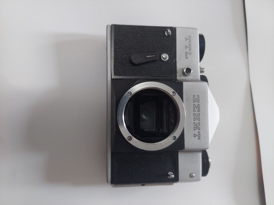 Лот с обьективом индустар и фотоаппаратом