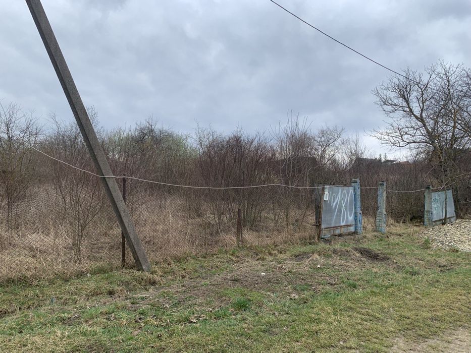 Продам терміново  земельну ділянку 24.7 сотки будинок по документах