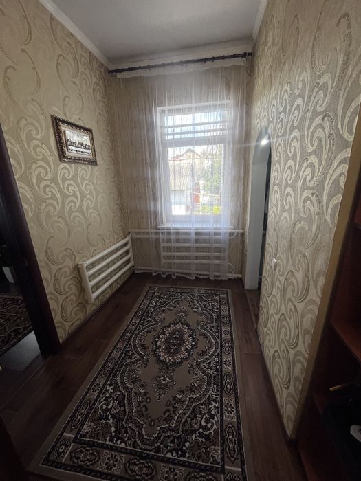 Продаж частини будинку з гаражем та літньою кухнею