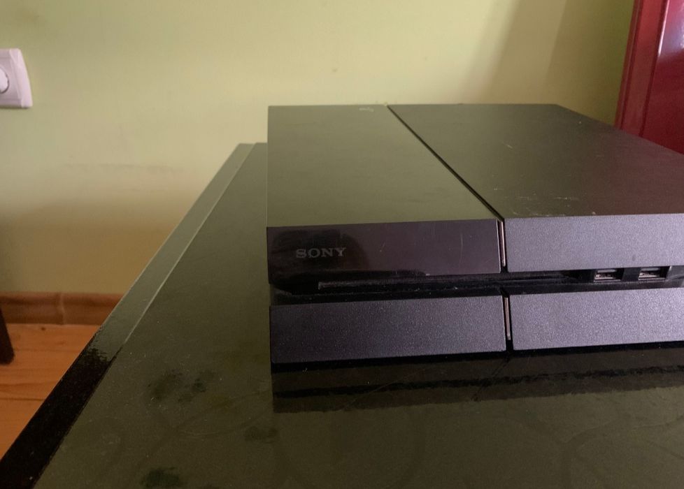 PlayStation 4 Fat 1TB — комплект із джойстиком та іграми