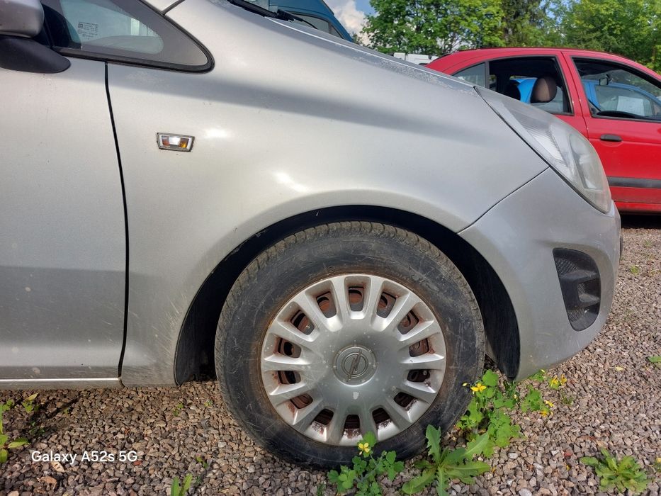 Błotnik lewy  prawy przedni Opel Corsa D Z157